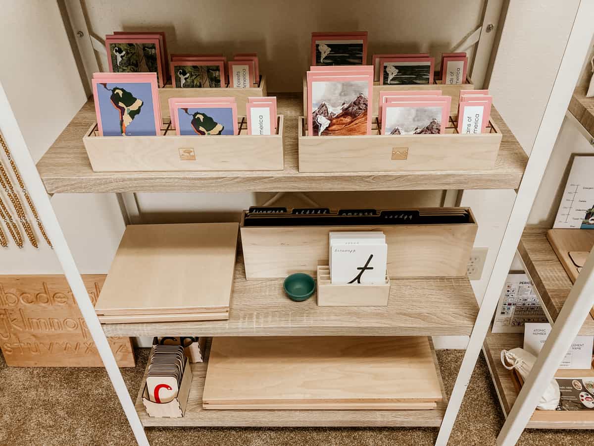 Montessori language shelves in a homeschool room