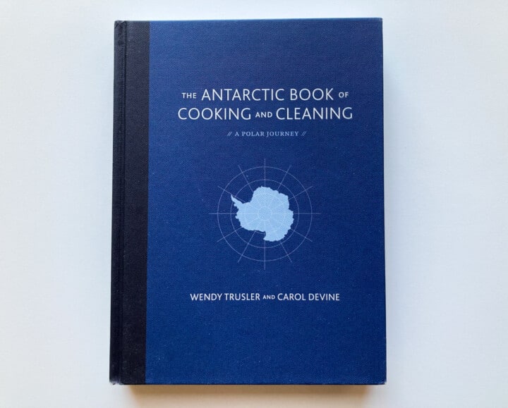Cover of The Antarctic Book of Cooking and Cleaning by Wendy Trusler and Carol Devine