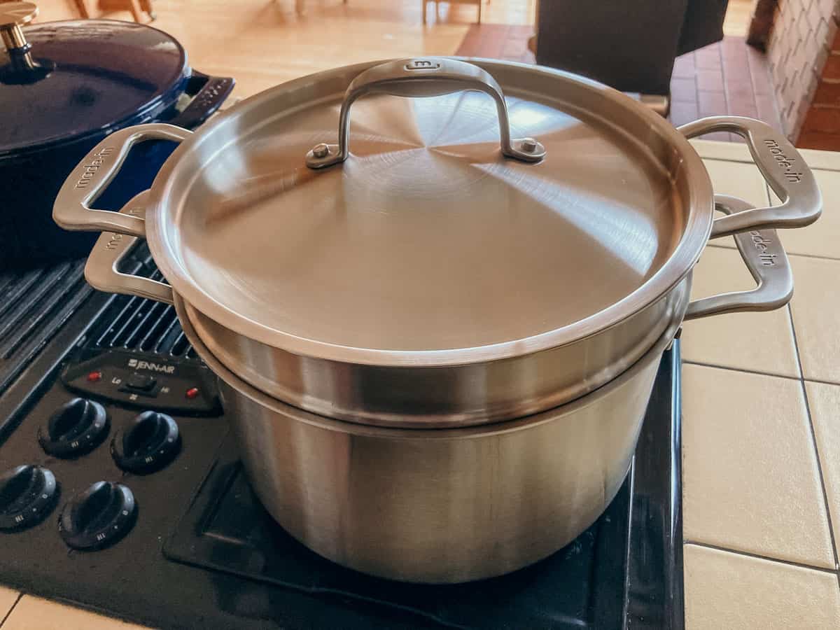 Made In stock pot with pasta insert on a farmhouse stove