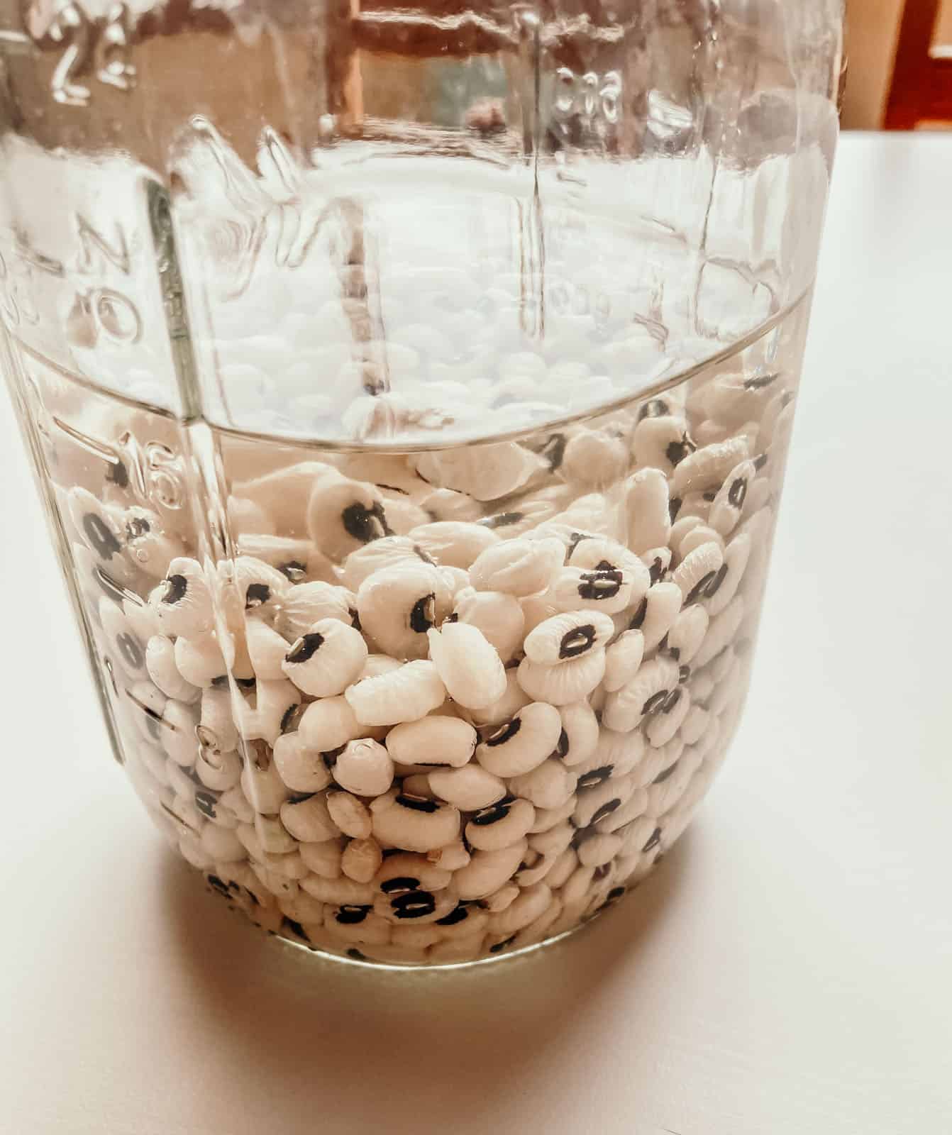 black-eyed peas soaking in a mason jar