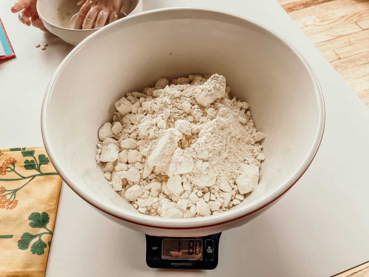 a bowl of flour on a digital scale