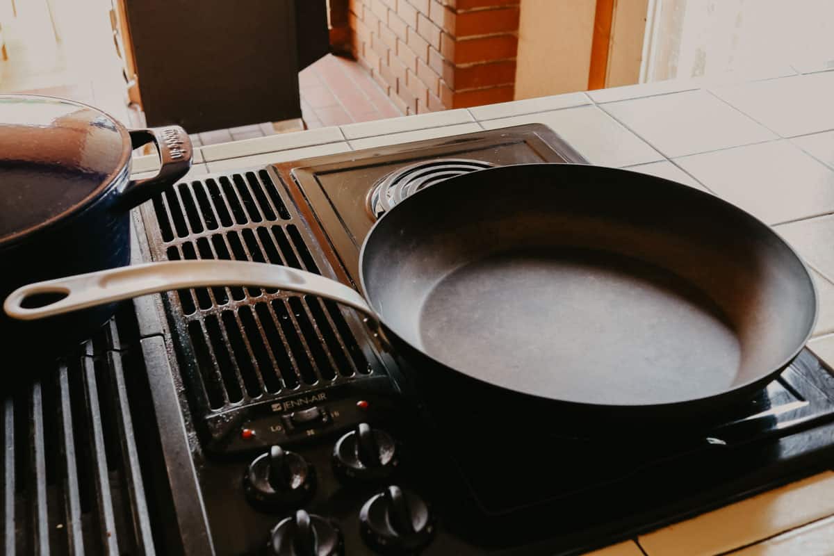 Mde In blue carbon steel frying pan 12" on the stove