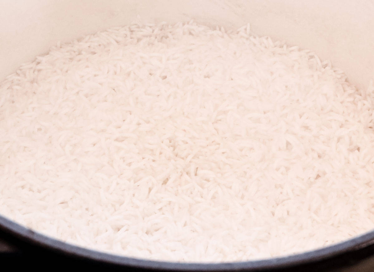 closeup of cooked Lotus Foods basmati rice in a Dutch oven