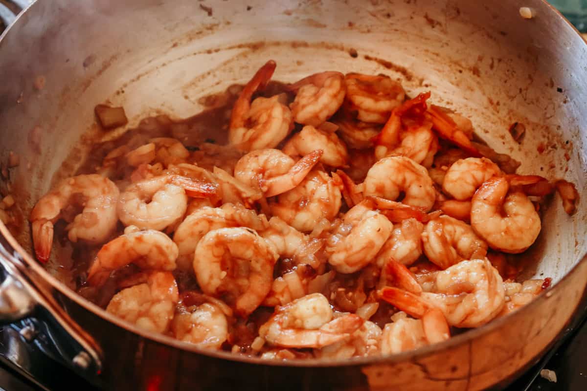 shrimp cooking in a saucier
