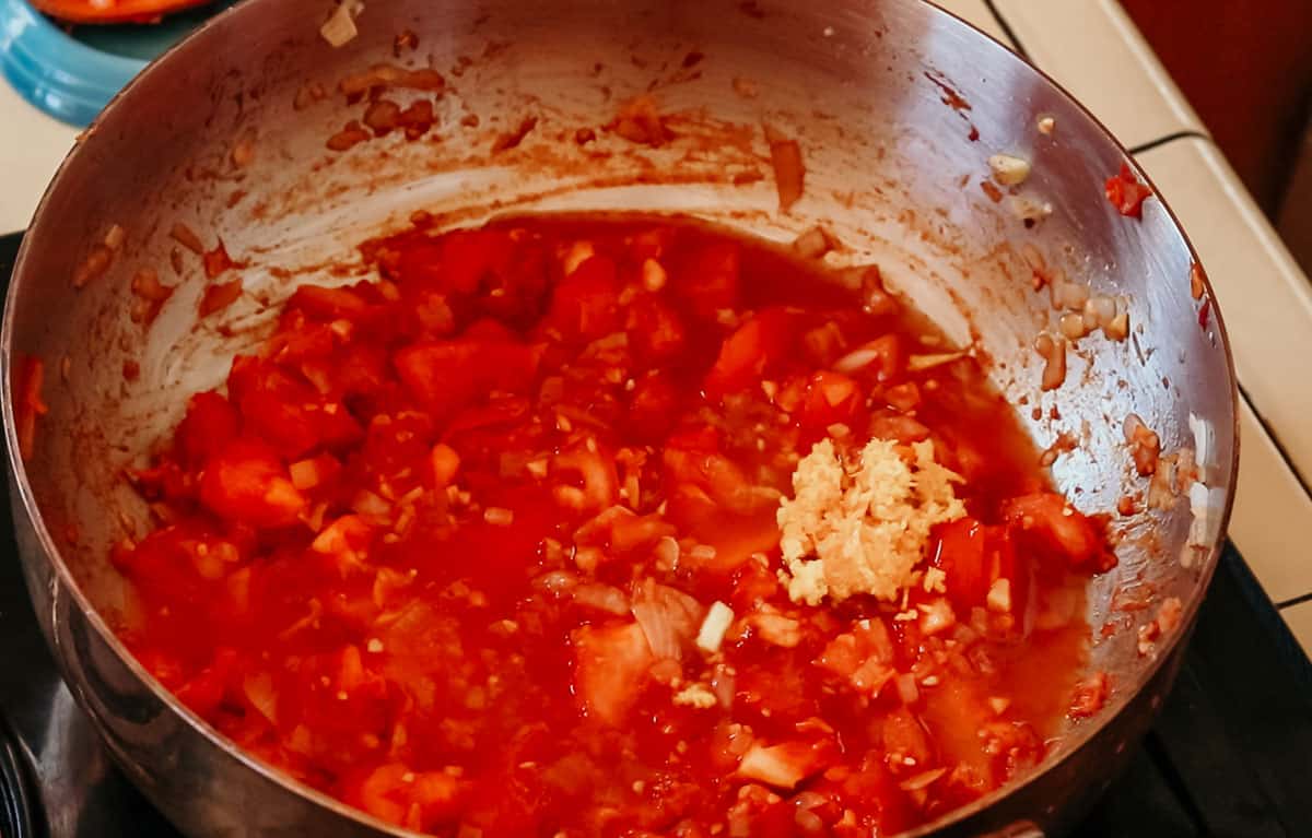 piri piri sauce ingredients in a saucier with orange zest added