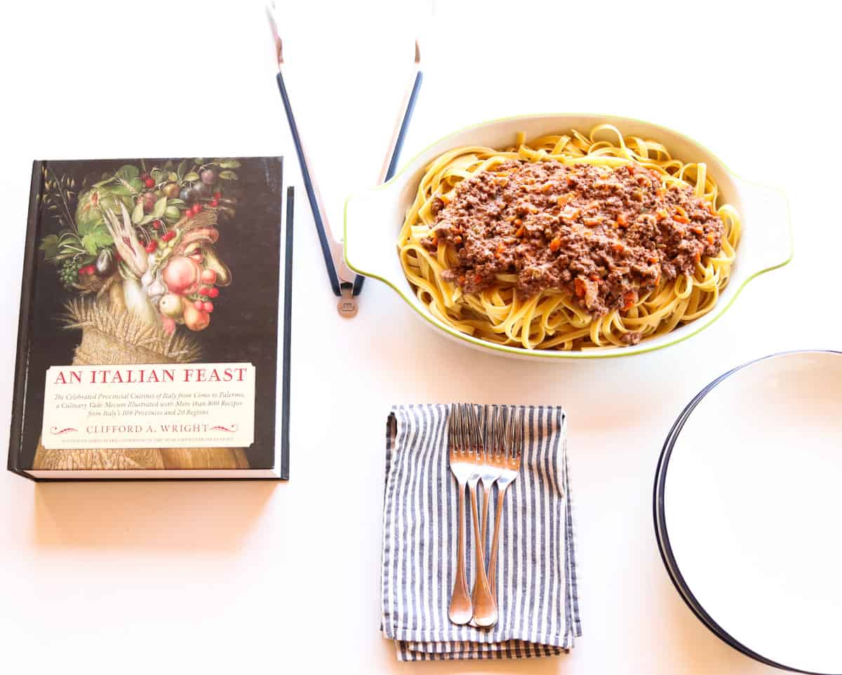 An Italian Feast and Bolognese in a baking dish on a kid's table