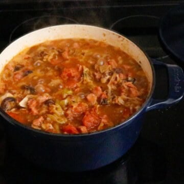 bigos in a Dutch oven on the stove