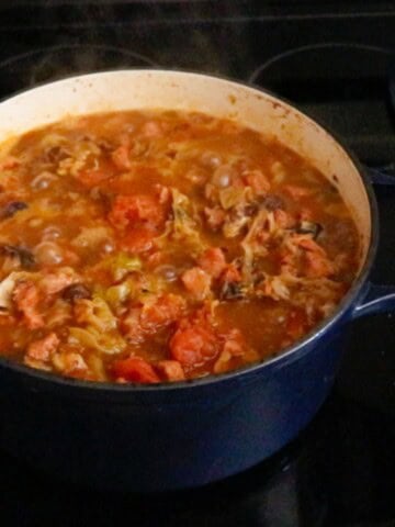 bigos in a Dutch oven on the stove