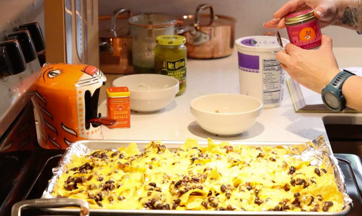 rajma nachos on a sheet tray and chaat masala