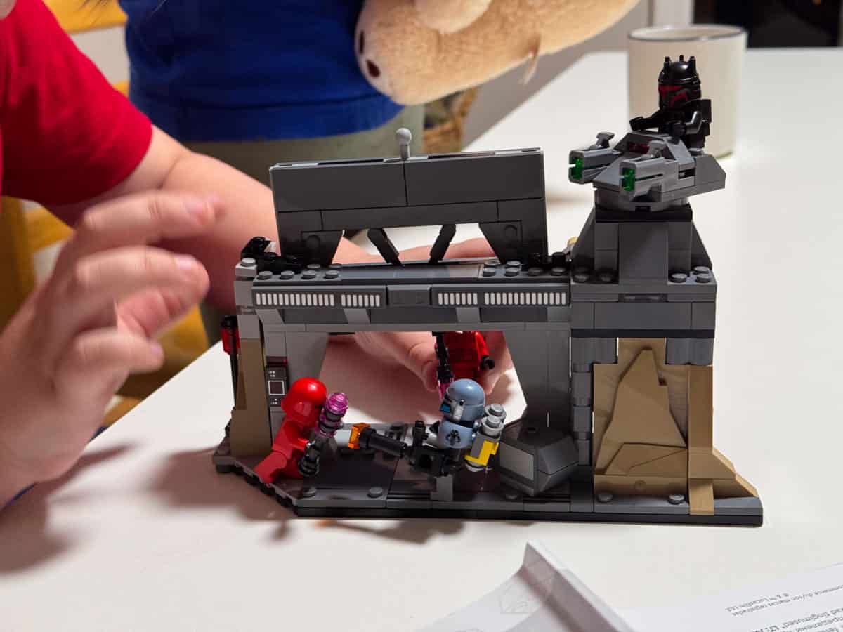 Noah is building the LEGO Star Wars Paz Vizsla and Moff Gideon Battle Mandalorian Toy