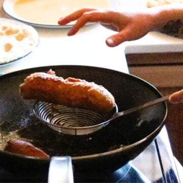 cheese piroshki on a spider strainer that just can't handle it