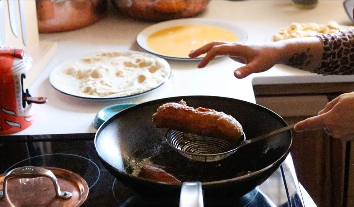 cheese piroshki on a spider strainer that just can't handle it