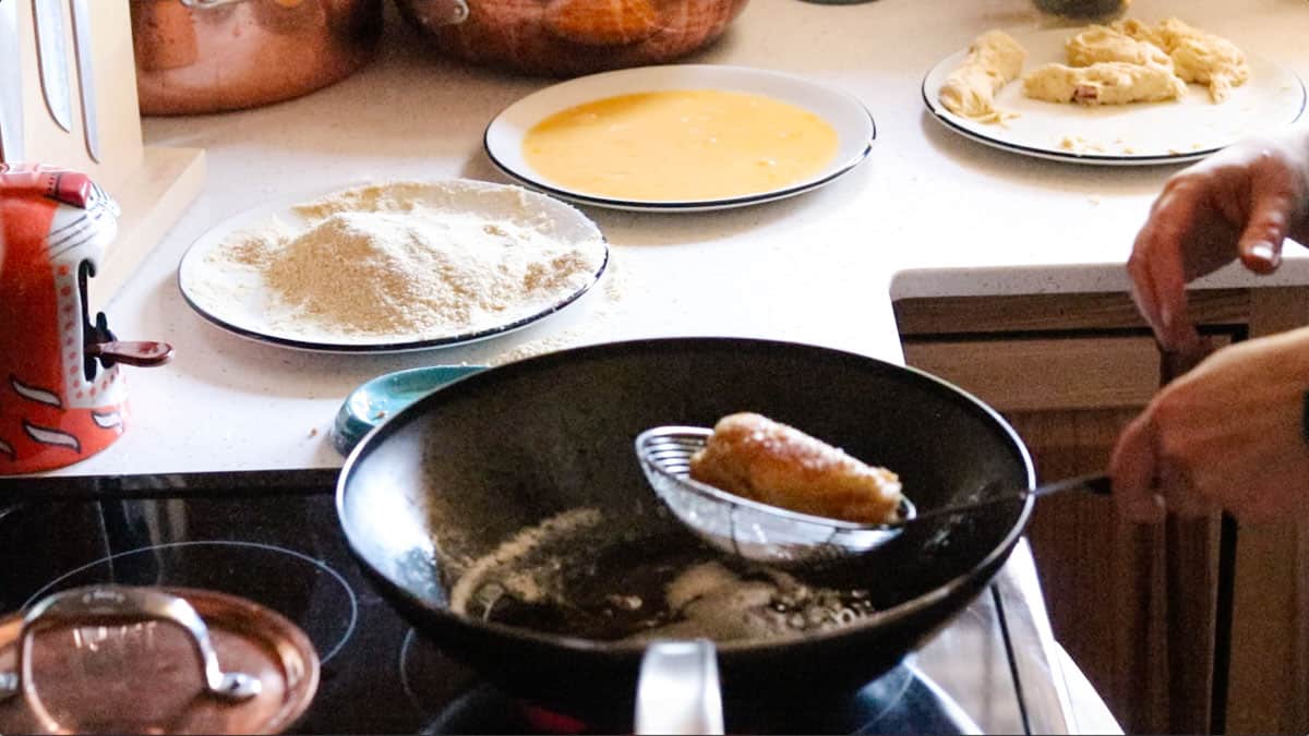 removing piroshki with spider strainer