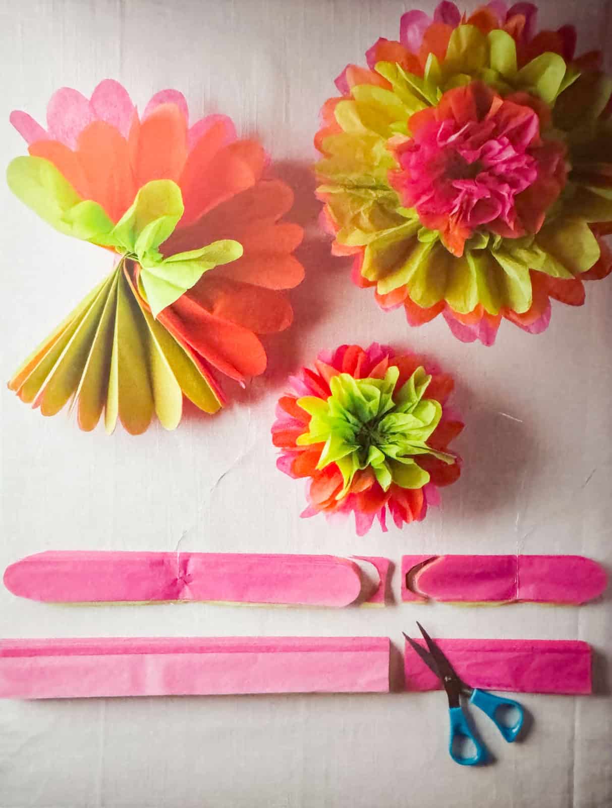 assembling tissue paper flowers from Dining with the Dead