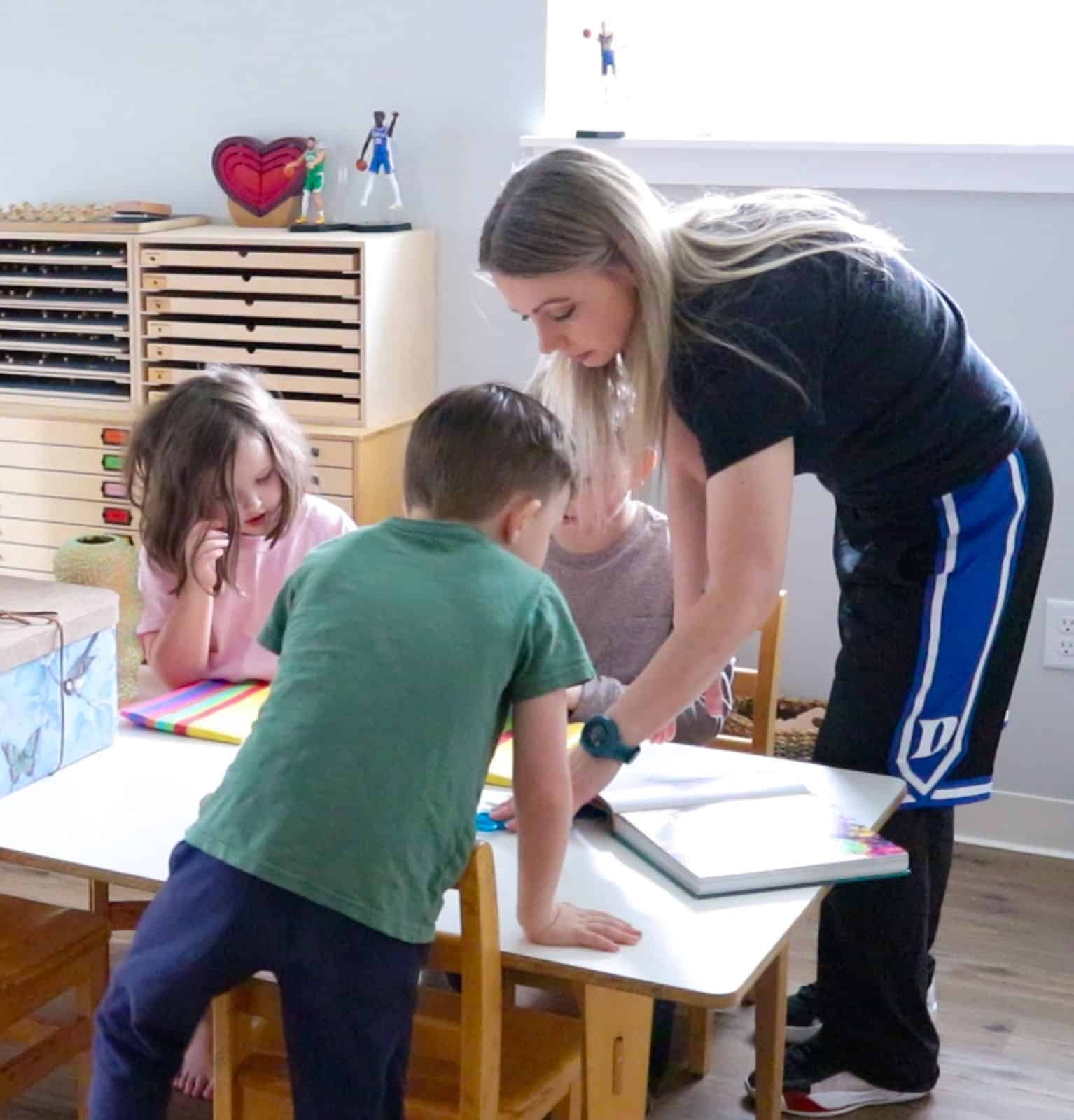 Kristin and the kids are learning how to make tissue paper flowers for Day of the Dead