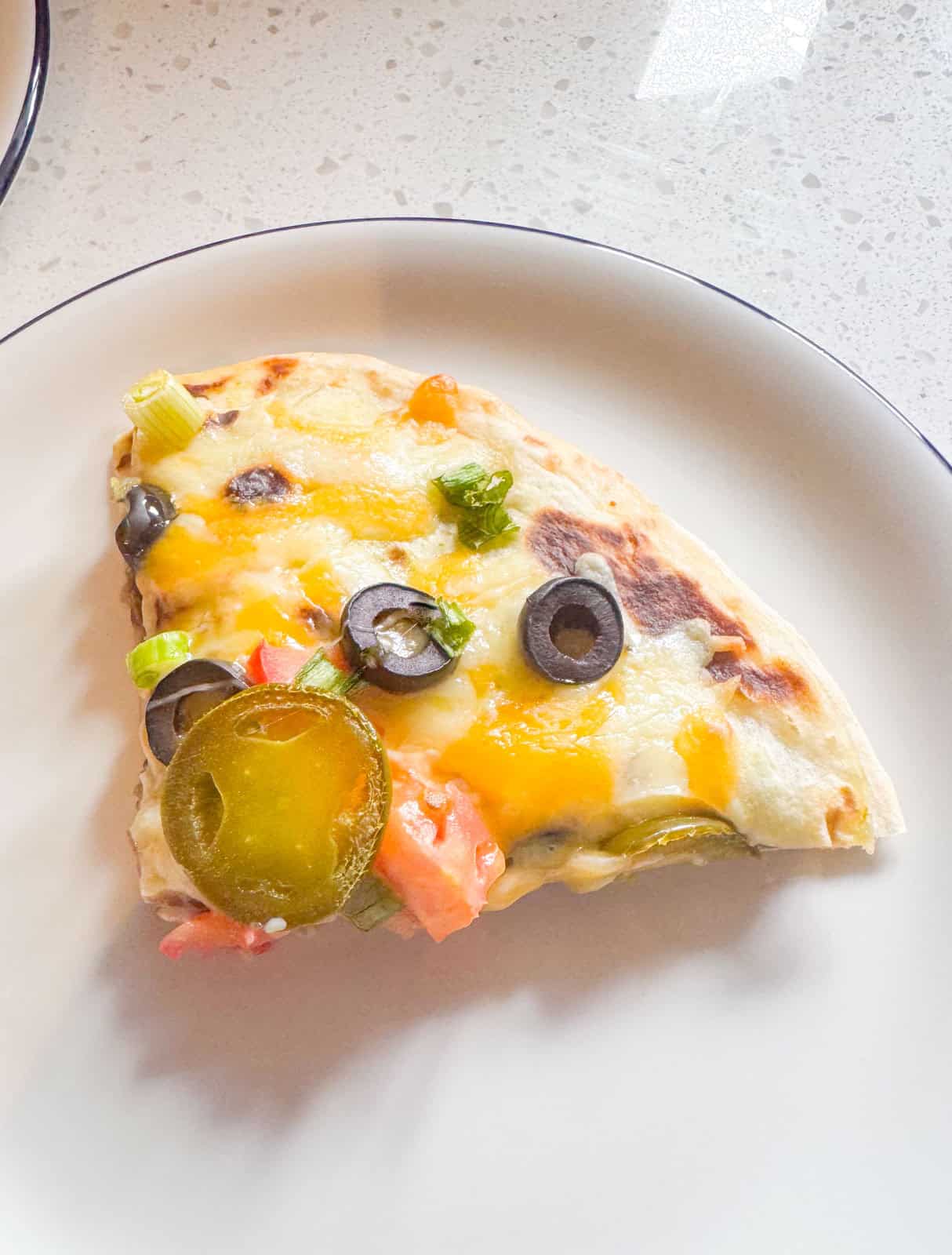 slice of homemade Mexican pizza