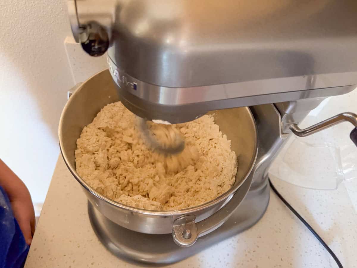 pizza dough ingredients in a mixing bowl