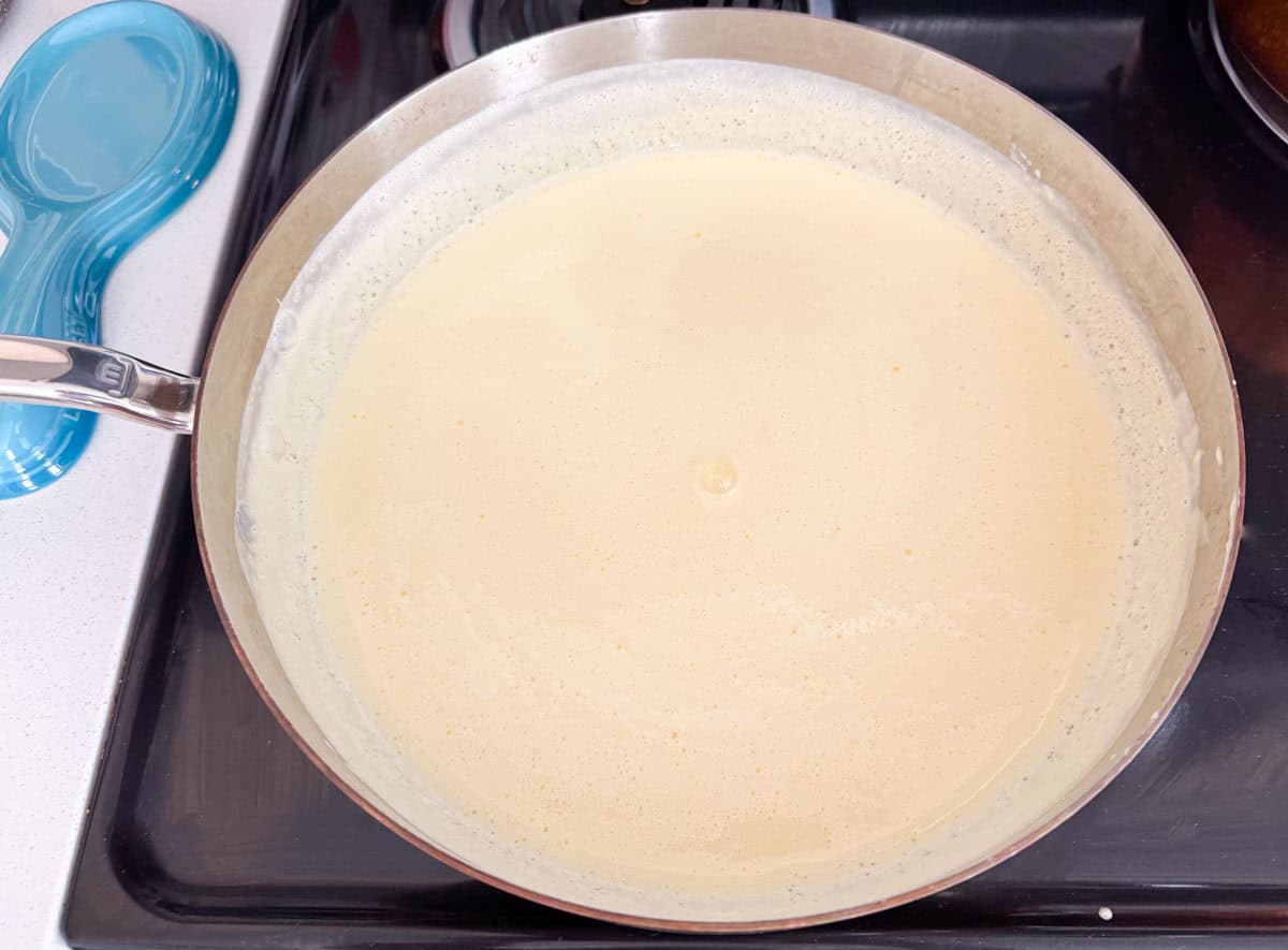 hot eggnog in a saucier