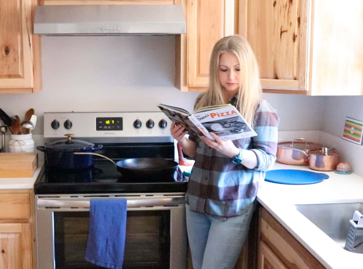 Kristin is reading The Scarr's Pizza Cookbook