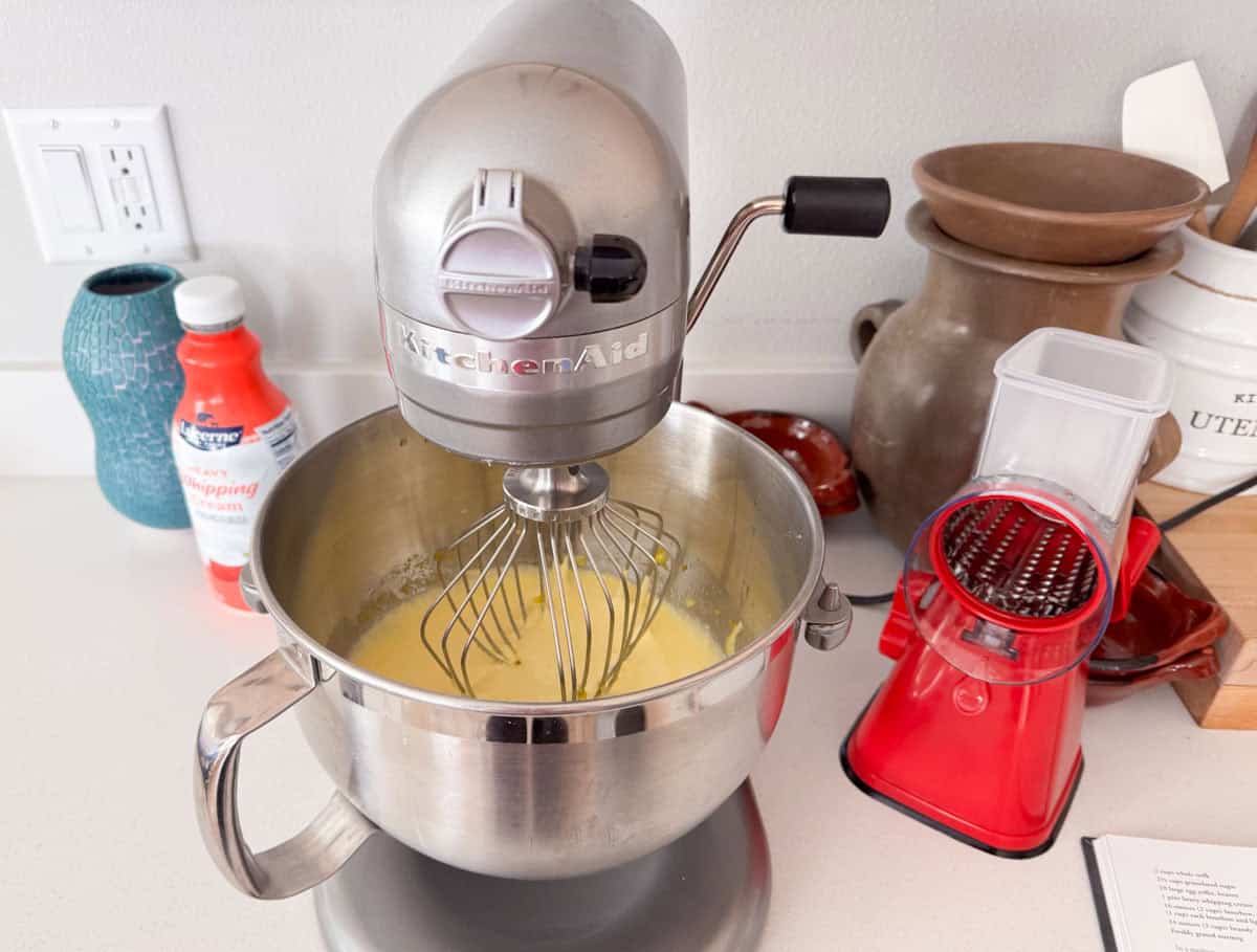 hot milk and egg mixture in a stand mixer