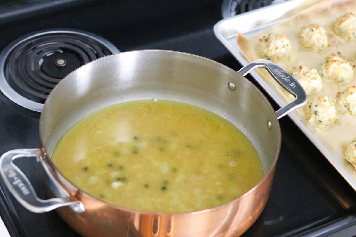 chicken piccata sauce beside ground chicken meatballs