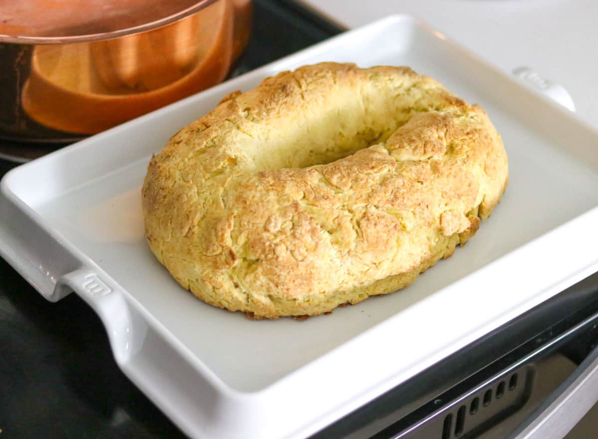 undecorated King Cake on a baking slab