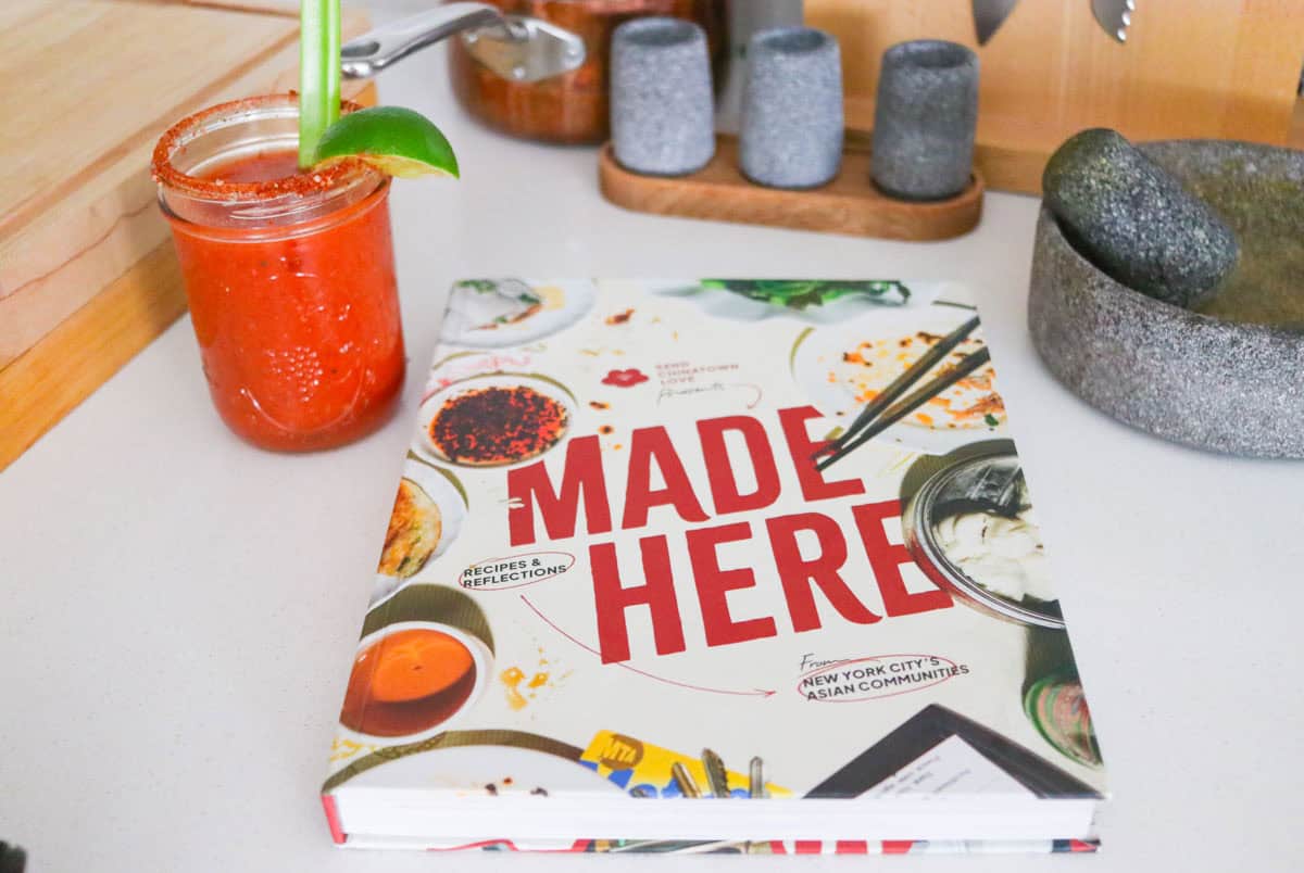 sake bloody mary beside Made Here Cookbook