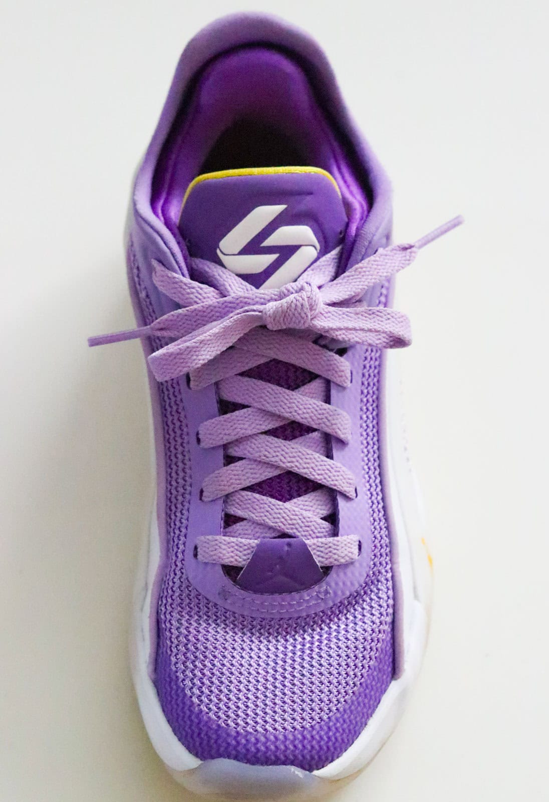 a double-knotted Luka 5 basketball sneaker in Luka Lifestyle colorway