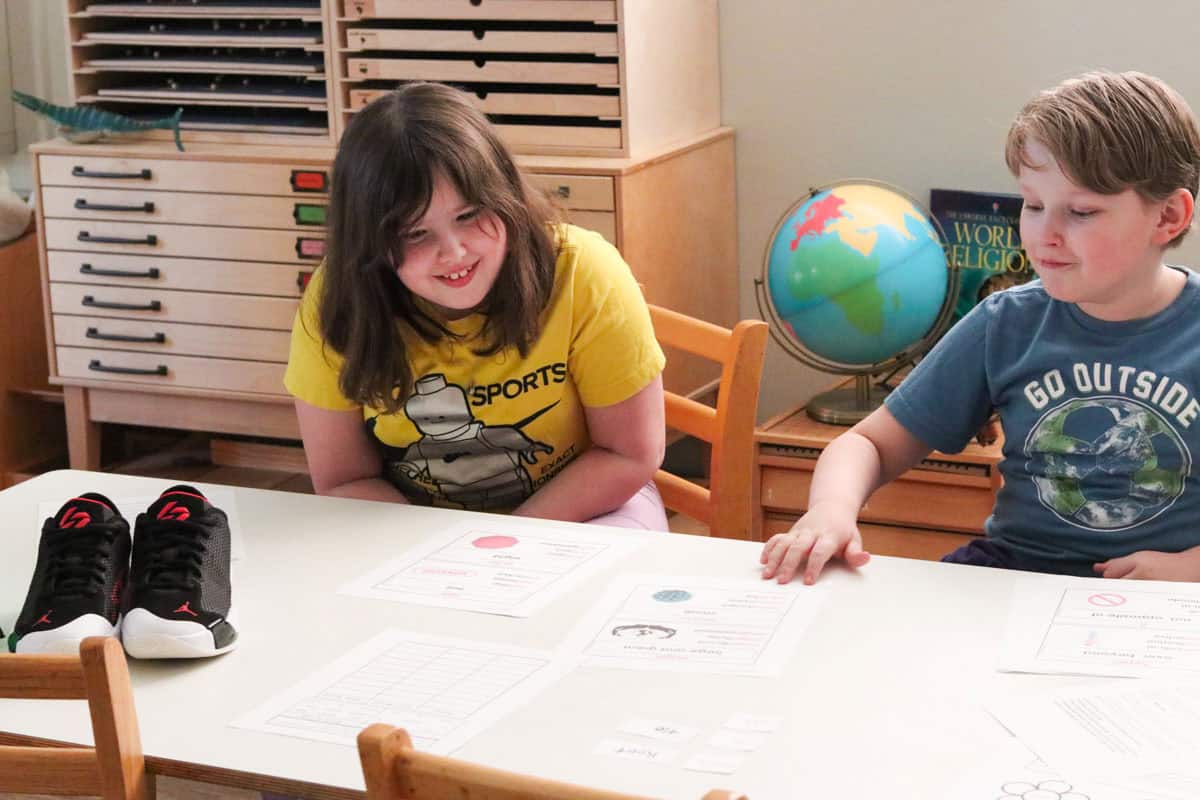 Kaia and Noah are reading Montessori Tube Academy Prefix printables