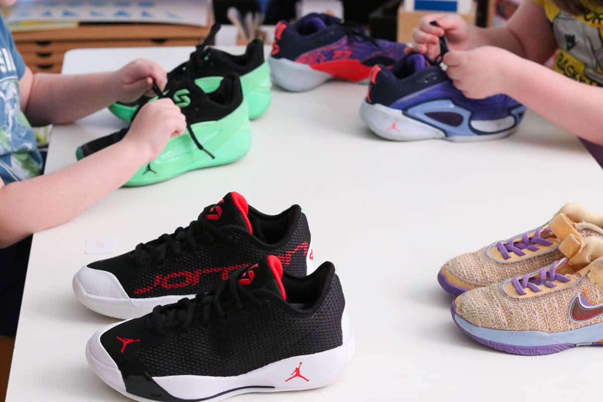 Noah and Kaia are tying Jordan Luka 5 and Jordan Luka 3 sneakers