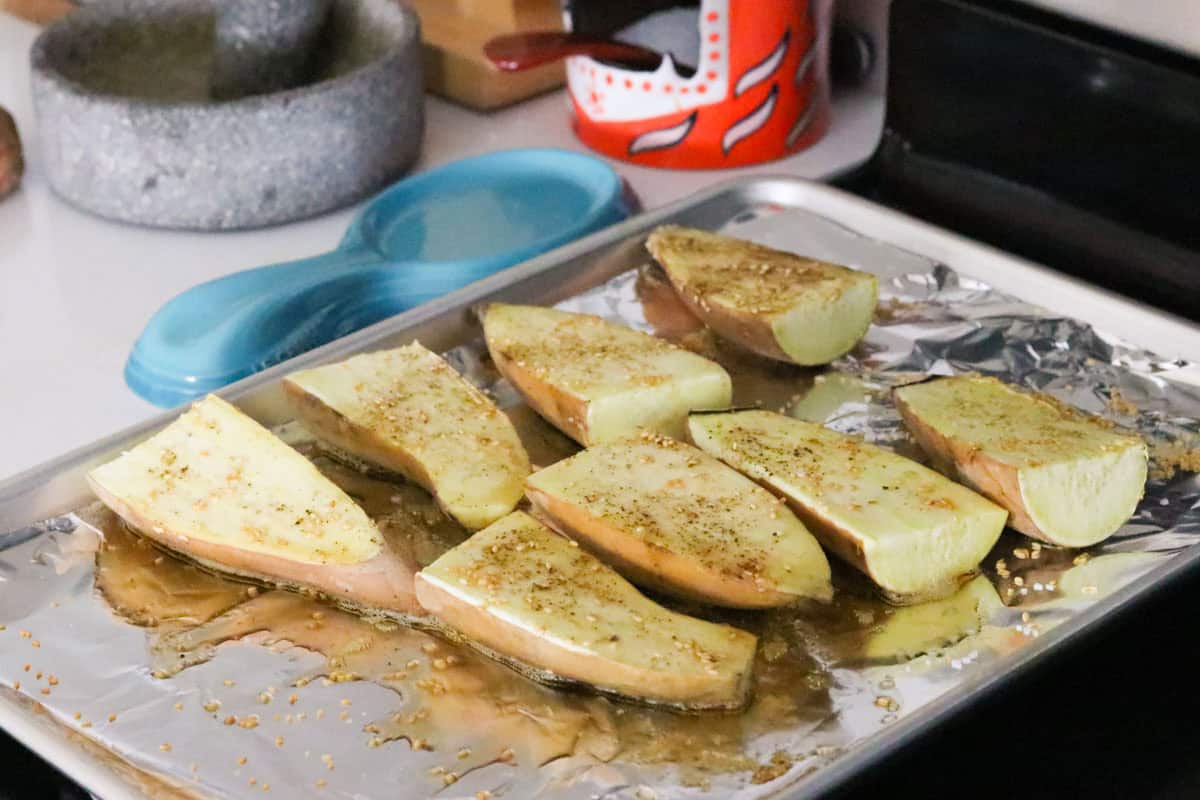 roasted sesame sweet potatoes on a sheet pan