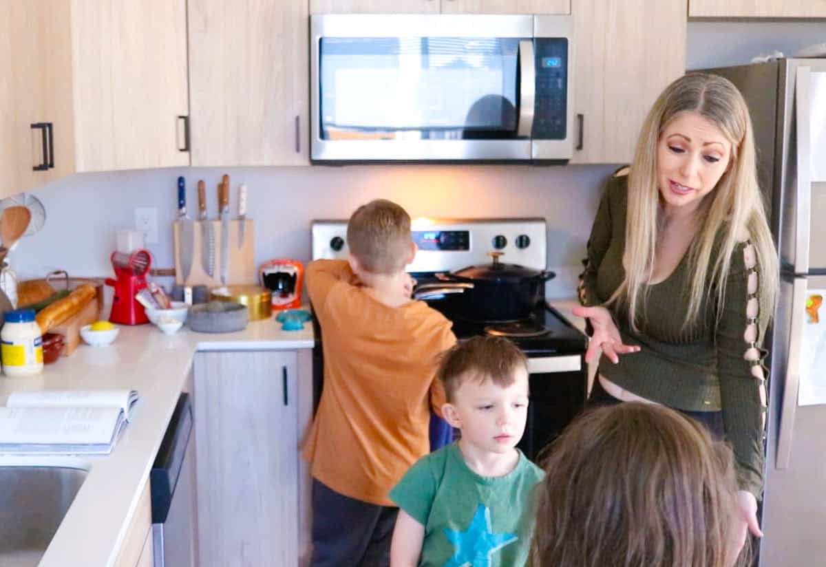 Kristin is talking to the kids