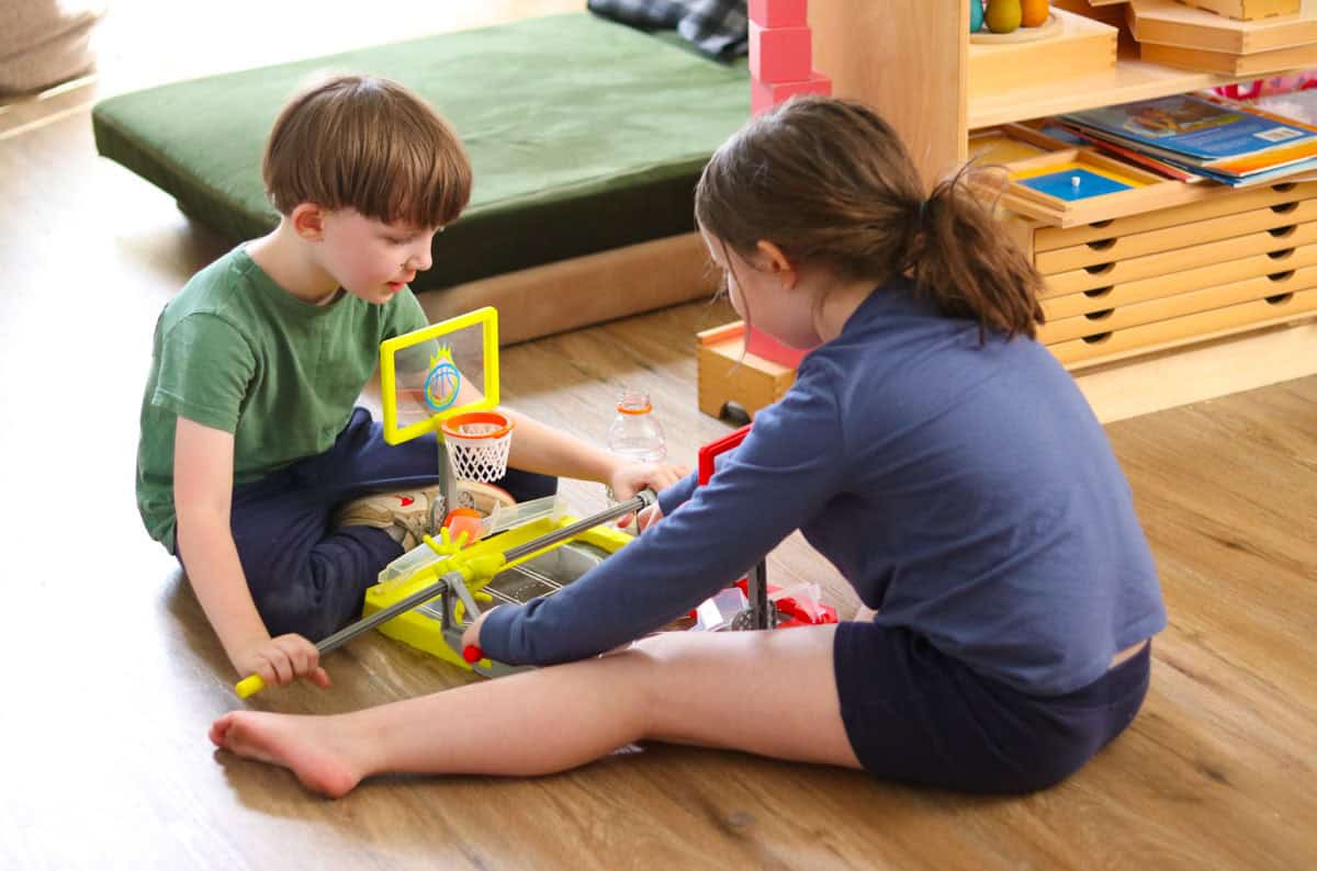 the kids are playing foosketball