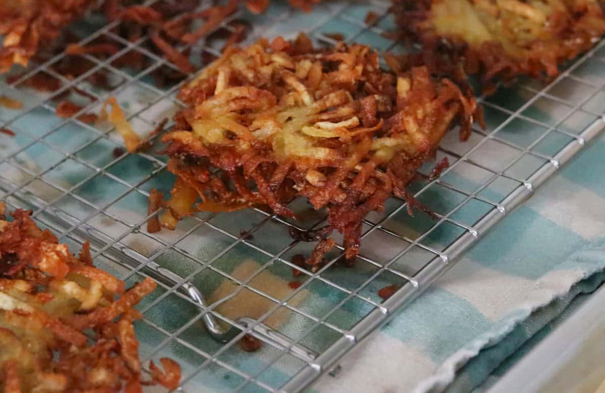 hash browns cooling on a wire rack