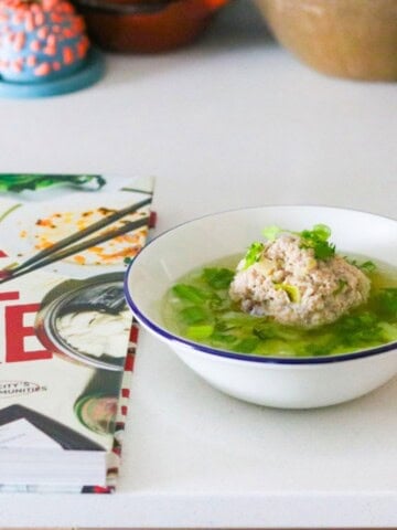 Lion's Head Meatball beside Made Here Cookbook