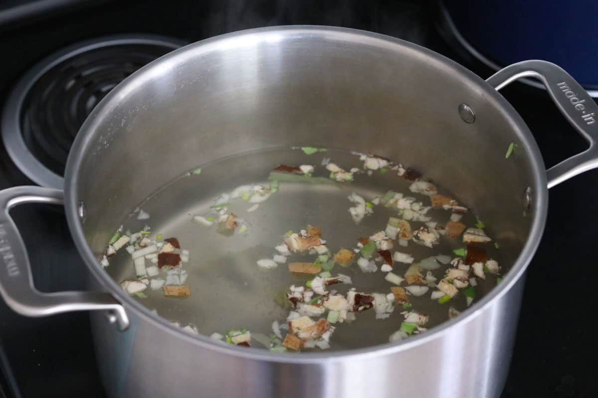 ingredients for making broth in a stock pot
