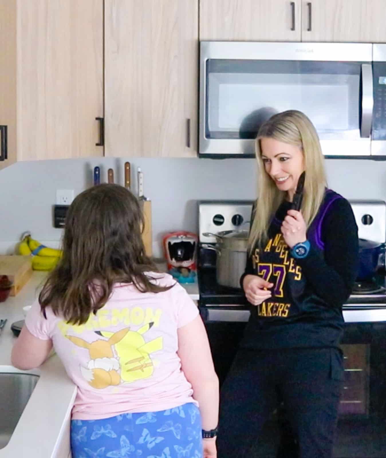 Kristin is holding a chef pocket knife