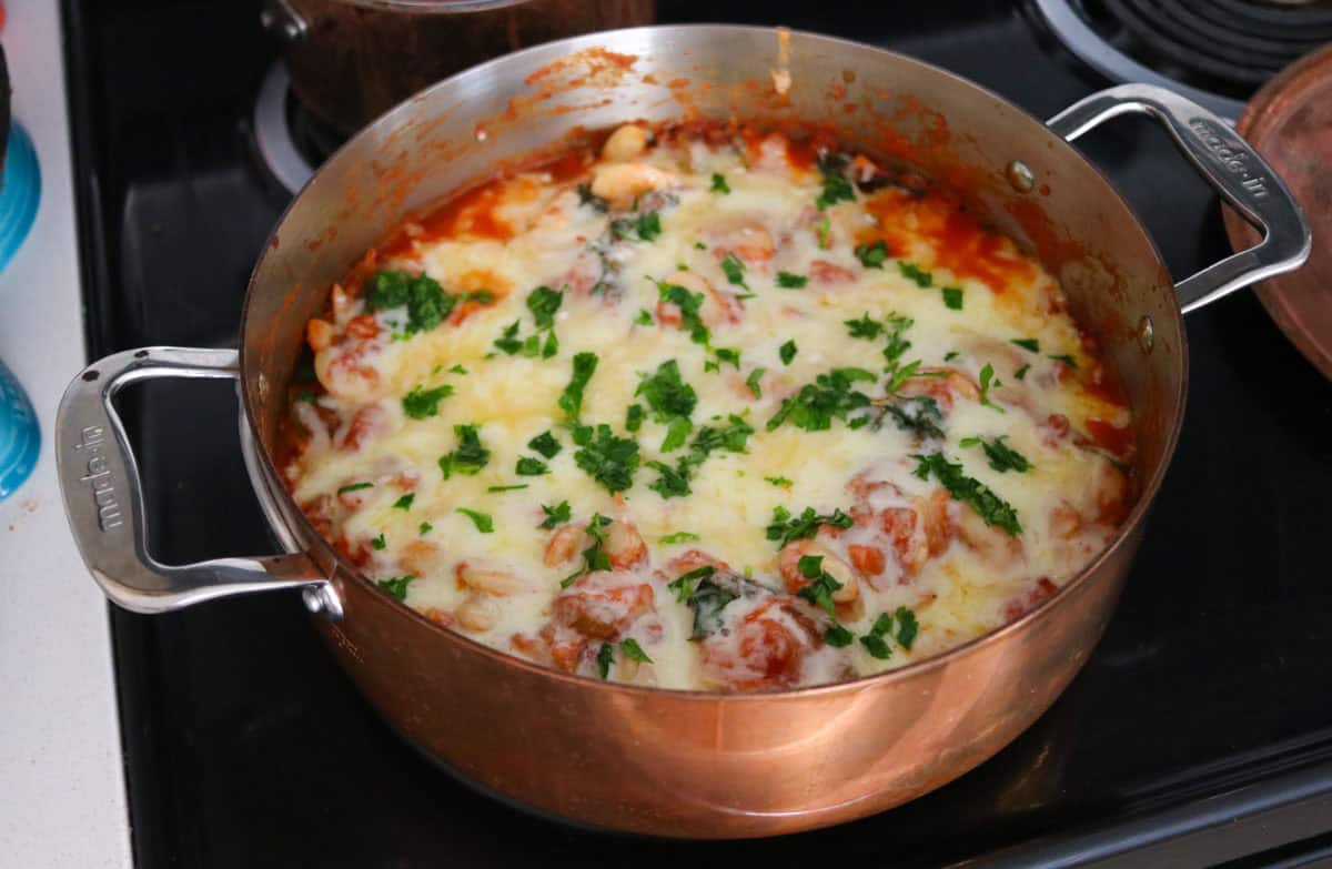 pizza beans in a copper rondeau