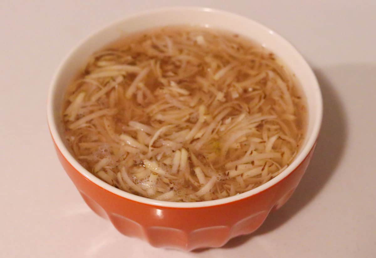 shredded potatoes in a brine