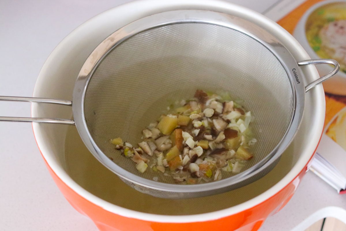 strained lions head meatballs broth