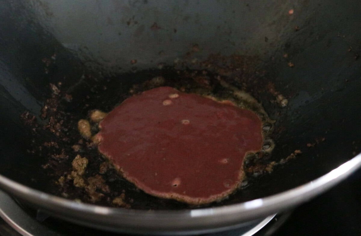 pureed chicken livers in a wok