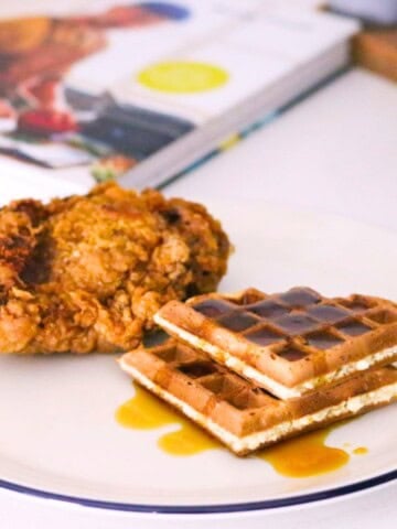 Hong Kong Chicken and Waffles plated beside Kung Food cookbook