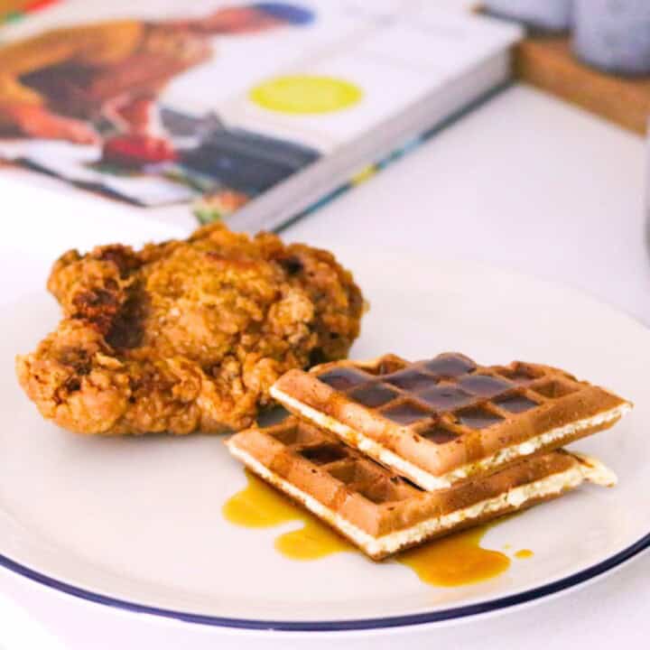 Hong Kong Chicken and Waffles plated beside Kung Food cookbook