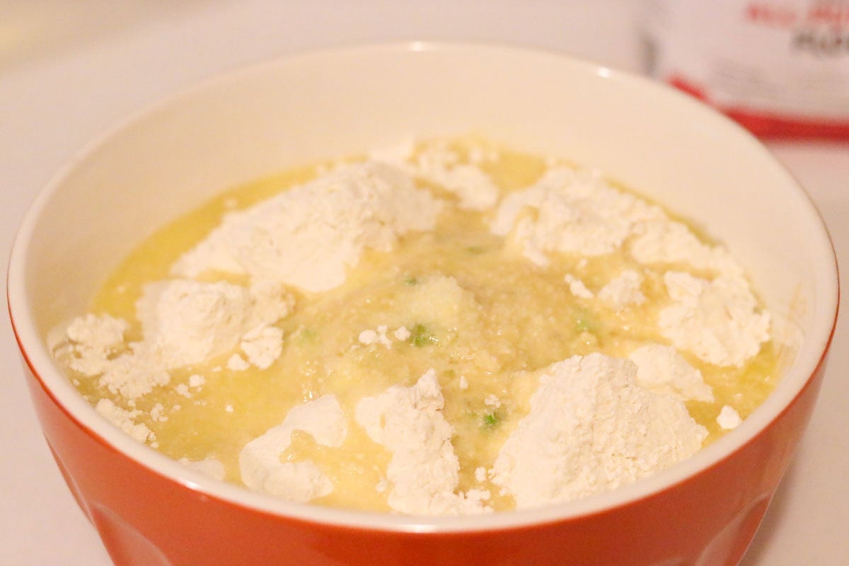 milk buns dough with melted butter in a bowl