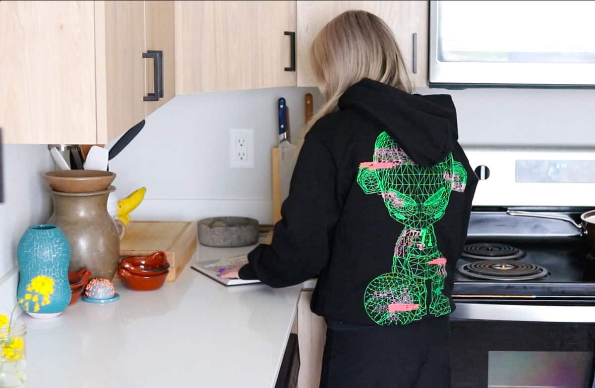 kristin is reading the cookbook