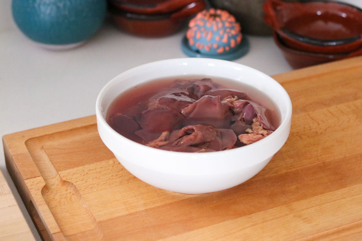 chicken livers soaking in water