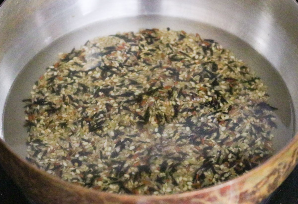 wild rice cooking in a saucier