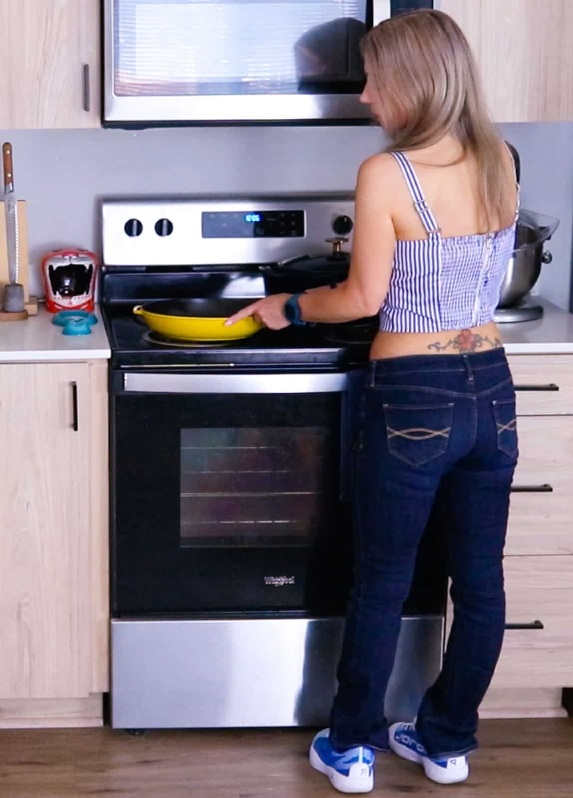 Kristin is prepping the stove for making beef braciole
