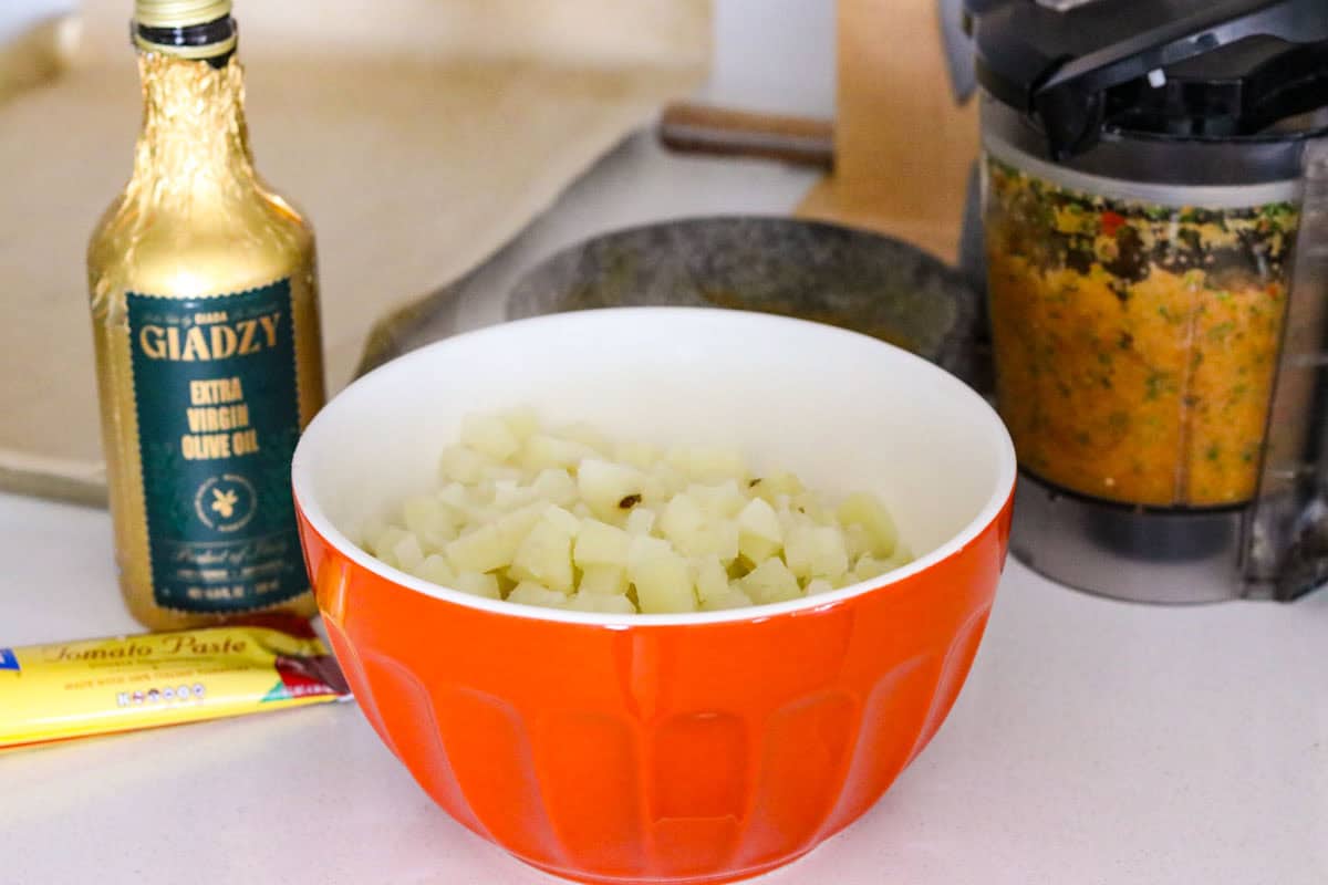 giadzy evoo, tomato paste, potatoes, sofrito