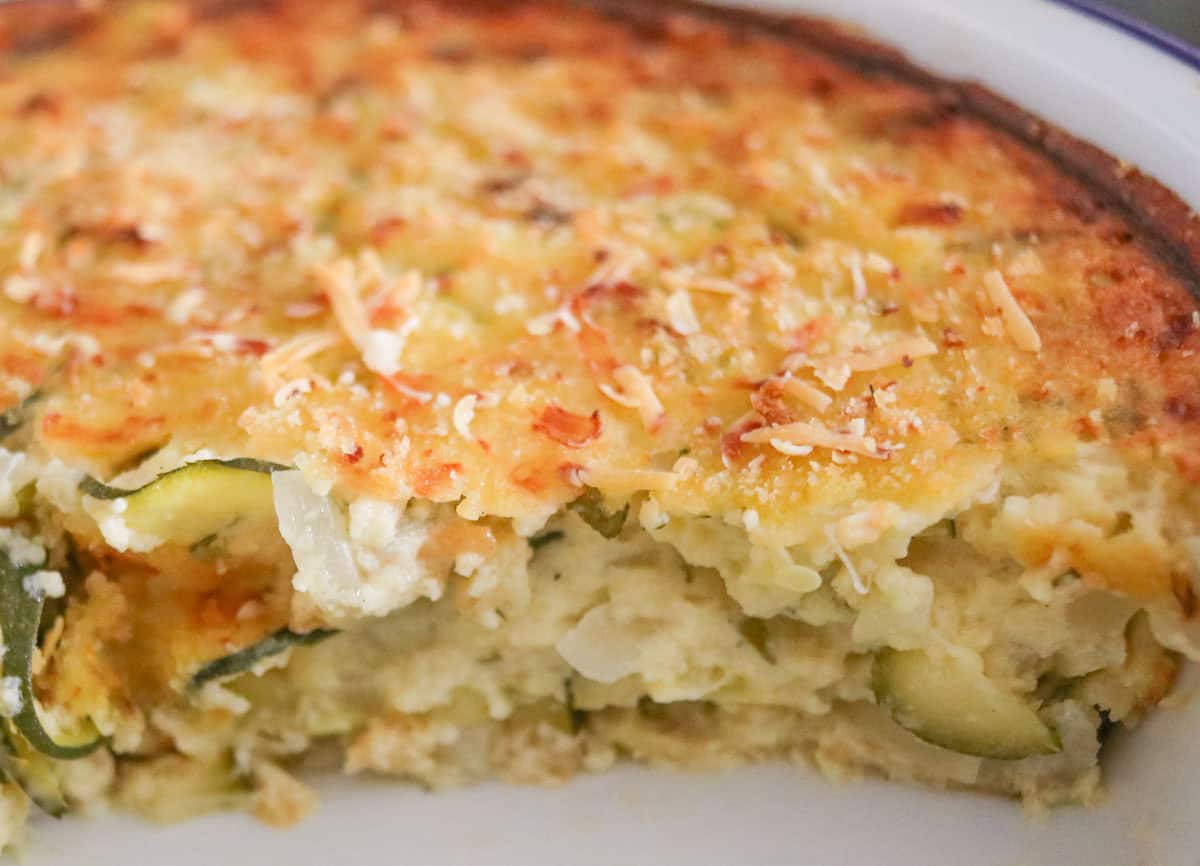 closeup of zucchini casserole in a pie dish
